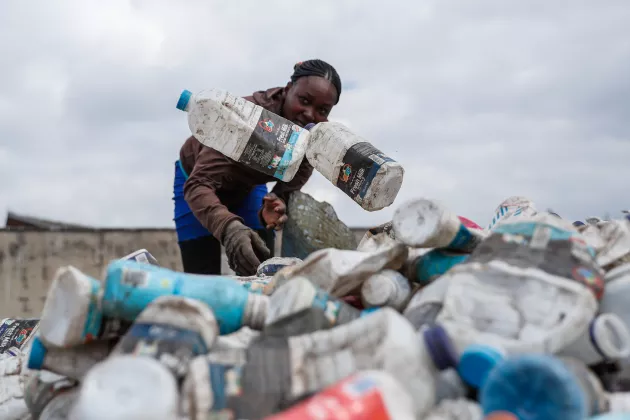 People removing plastics