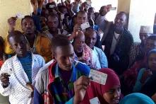 Voters in Hargeisa holding up their registration cards in the 2017 presidential elections (Image by, Ulf Terlinden)