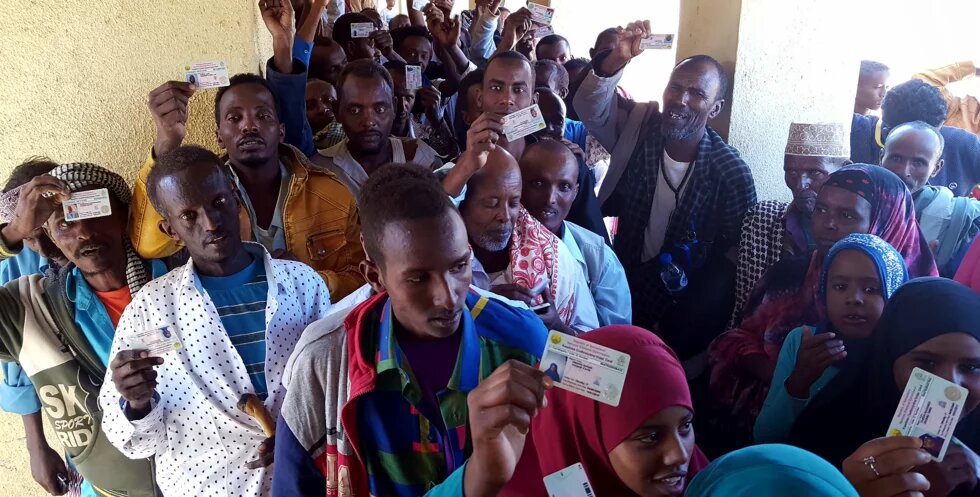 Voters in Hargeisa holding up their registration cards in the 2017 presidential elections (Image by, Ulf Terlinden)